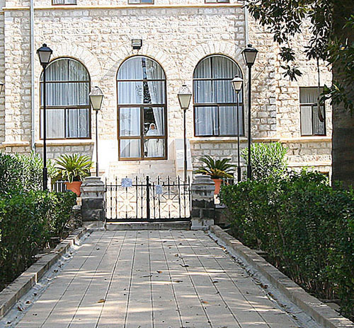 41 Israel. Nun in doorway near Church of Beautitudes
