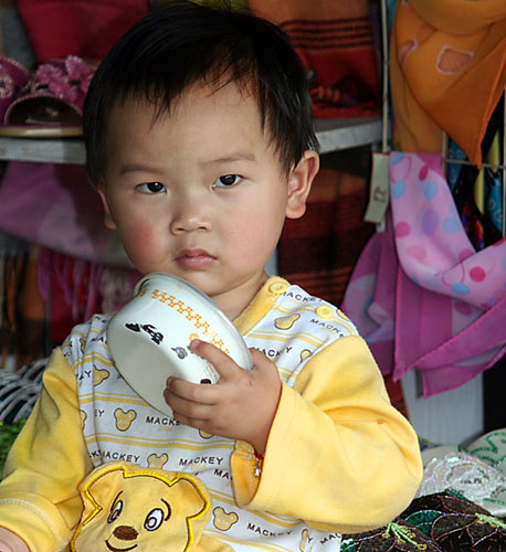 11 Portrait little boy in shop