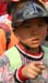 15 LIttle boy in huge visor pointing at a Panda