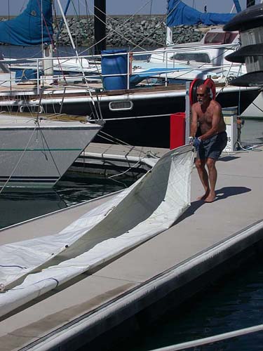 Folding the Sails at Mackay Marina