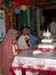 DSCN2077SittingbytheWeddingCake